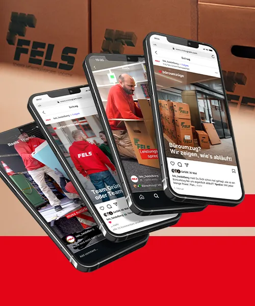Social Media Strategie Website - Vier Smartphone-Mockups mit FELS Instagram-Reels und Posts, vor gebrandeten FELS-Umzugskartons.